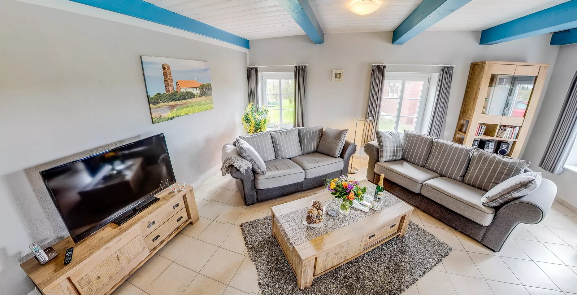 Wohnzimmer der Ferienwohnung Alte Kirche im Kastanienhof auf Pellworm